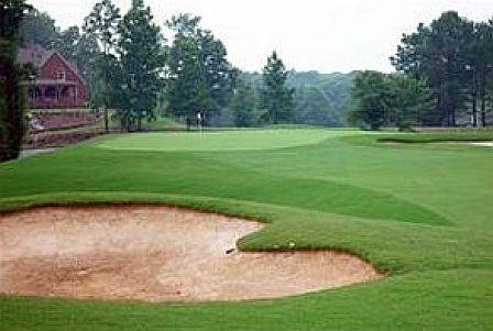 Image of a sand trap on a golf course.